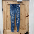 WOMENS AMERICAN EAGLE LT DENIM DIST. JEANS 0