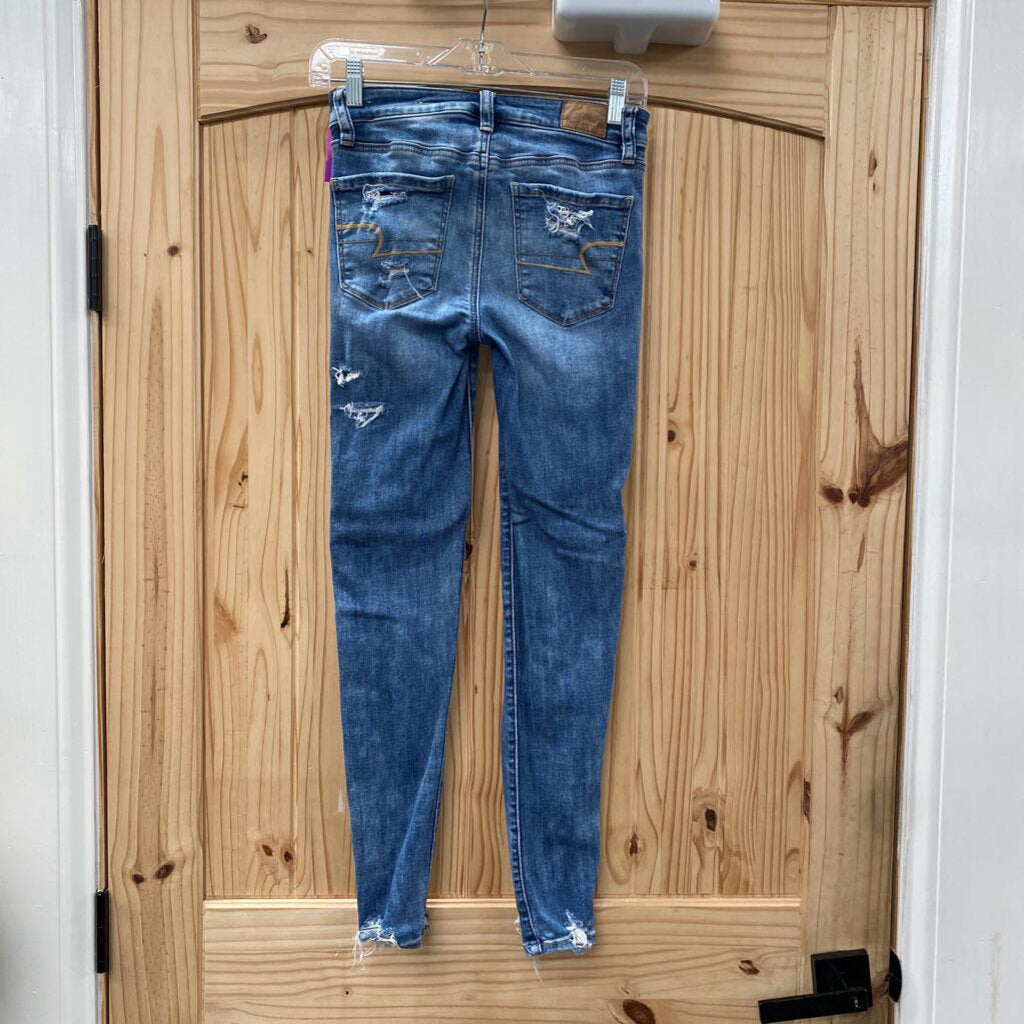 WOMENS AMERICAN EAGLE LT DENIM DIST. JEANS 0