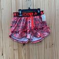 GIRLS UNDER ARMOUR SHORTS BRIGHT CORAL/PLUM YSM 8